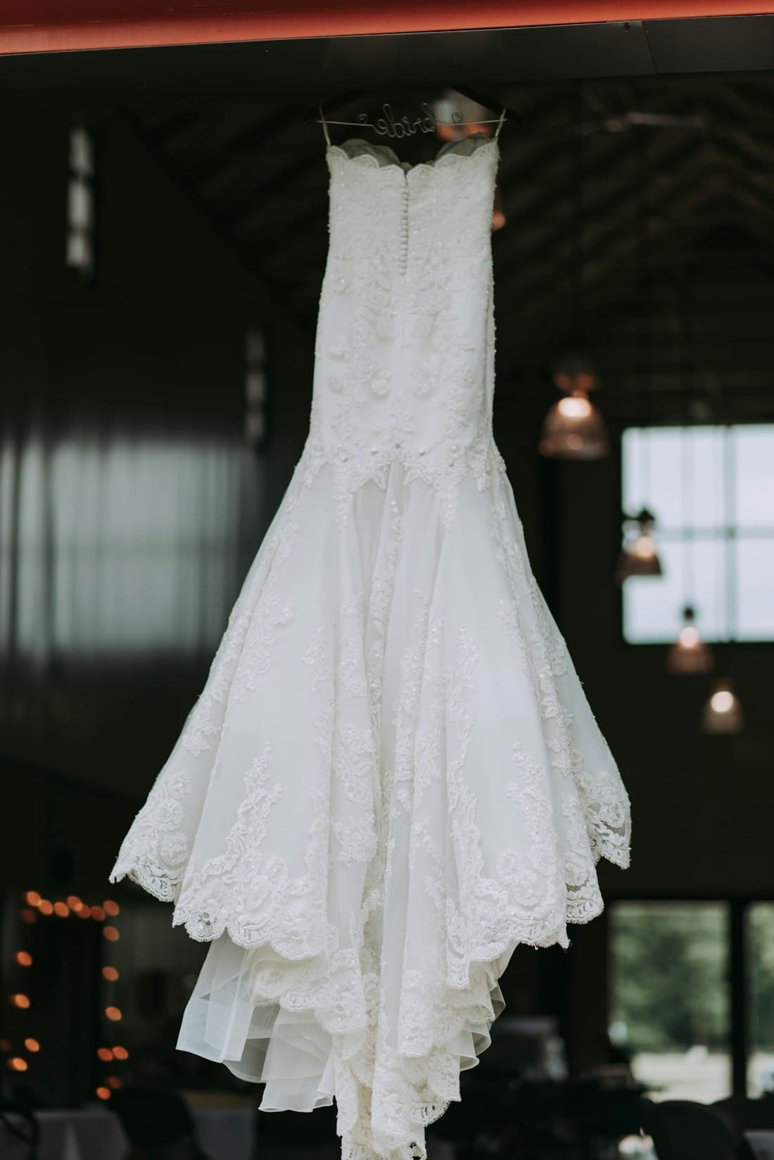 A fishtail designer sample wedding dress on the rail at Bo & Co
